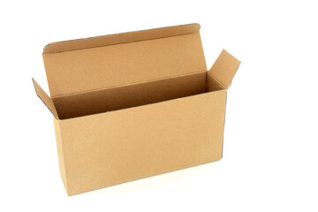 Slimline brown cardboard rectangular shape box on white background. Environmentally friendly recycled reusable material for delivery parcel package