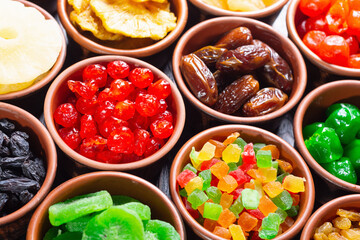 Group of dried and candied fruit in bowl