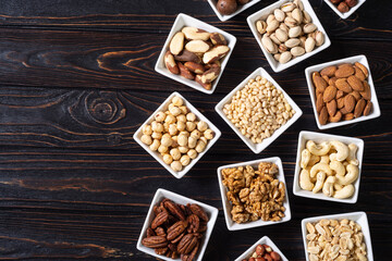 Mix of nuts in bowl . Food background
