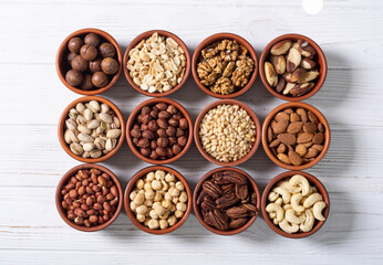 Mix of nuts in bowl . Food background