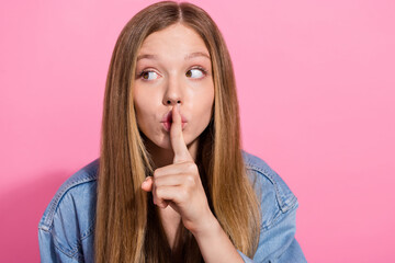 Fototapeta premium Photo portrait of lovely teen young lady keep secret look empty space dressed stylish denim garment isolated on pink color background
