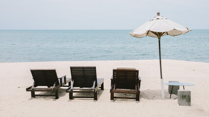 beach chairs and umbrella