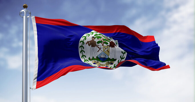 Belize national flag waving in the wind on a clear day