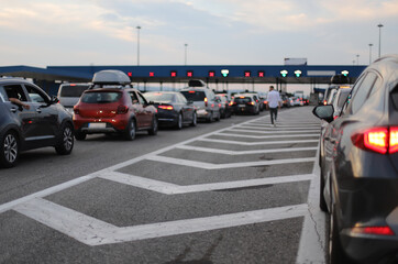 Cars on the road, border checkpoint