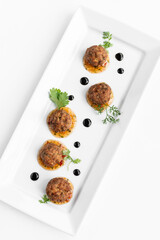 thai fish cake balls in gourmet contemporary restaurant on white background - 630318935
