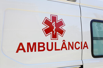 closeup of generic ambulance car description - in portuguese: ambulancia