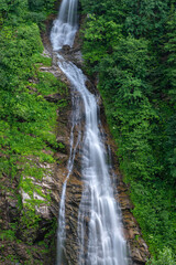 Fototapeta na wymiar Tikço (bridal veil) Waterfall. Long exposure waterfall photos. Waterfalls in Türkiye. Ayder, Rize Türkiye. 