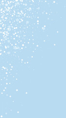 Falling snowflakes christmas background. Subtle flying snow flakes and stars on light blue winter backdrop. Beautifully falling snowflakes overlay. Vertical vector illustration.