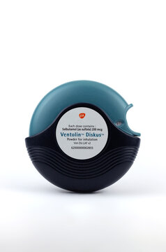 Illustrative Editorial of a Ventolin Diskus on a soft white background; inhaler used to treat symptoms of asthma and other bronchial disorders