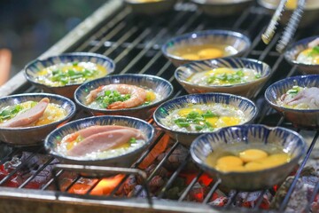 banh can or can cake in the ho thi ky street, ho chi minh city