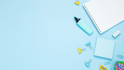 Mockup notebooks and set of stationery for work and study on blue background. Back to school. Top view, flat lay, copy space