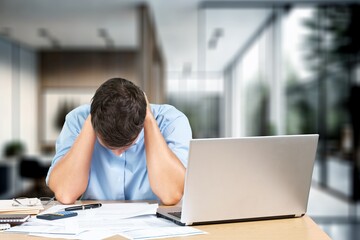 Obraz premium Stressed, tired business man overworked late in office, AI generated image