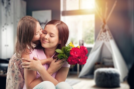 Happy mother with cute daughter at home, AI generated image