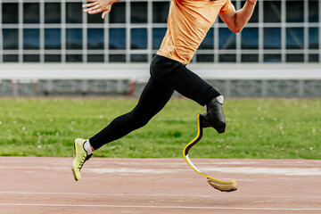 athlete disability running sprint race at athletics competition, sports summer games