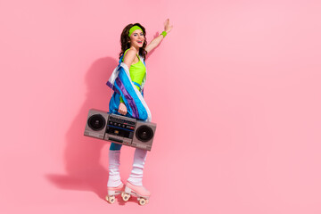Photo of funny fun lady sporty coach prepare boom box music for energetic pilates practice isolated...