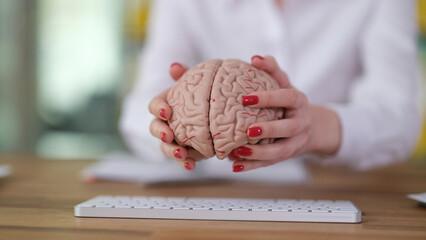Programmer manager puts brain anatomy on computer keyboard. Development of artificial intelligence