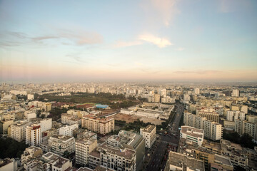 Fototapeta premium View of the skyline and cityscape of Casablanca city from above before sunset, Morocco