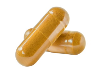 Herbal capsules, herb turmeric capsules on isolated transparent PNG Background.