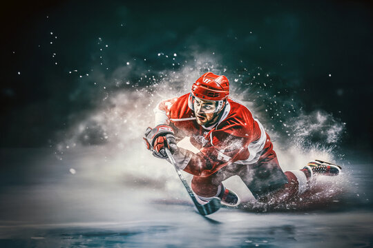Close-up auf einen Eishockeyspieler in Aktion in einem Stadion beim Wettkamp.