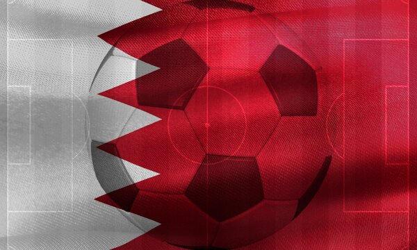 Photo of a waving Bahrain flag with a football ball-shaped outline in the center