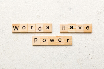 Words have Power word written on wood block. Words have Power text on table, concept