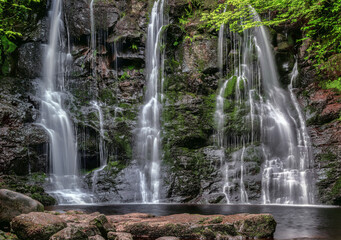 Fototapeta na wymiar A view of the Ess-Na-Crub Waterfall in the Glenariff Nature Reserve