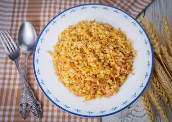 Traditional delicious Turkish food; Bulgur pilaf with vermicelli (Turkish name; sehriyeli bulgur pilaf)