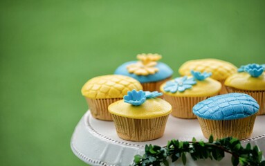 There is a plate of small cakes on the table