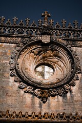 Beautiful shot of the rusty historic exterior of the Tomar Convent in Portugal