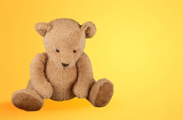 Cute soft Toy Bear on background