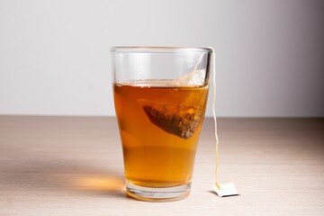 Tea glass cup with tea bag. Tea cup isolated