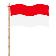 the red and white flag flutters on a bamboo pole
