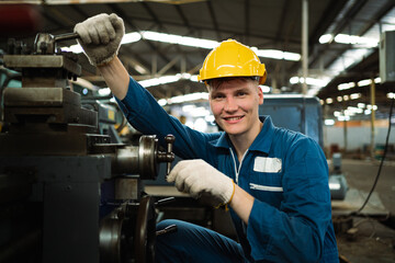 Heavy industry worker engineer wearing safety gear working in industrial factory background. steel plant industry