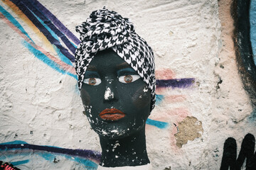 Bonnet-Turban foulard in face mannequin in the street of cartagena Colombia 