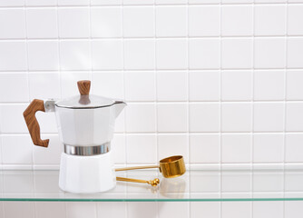 Geyser coffee maker and drinking coffee in the morning. Copy space for text.