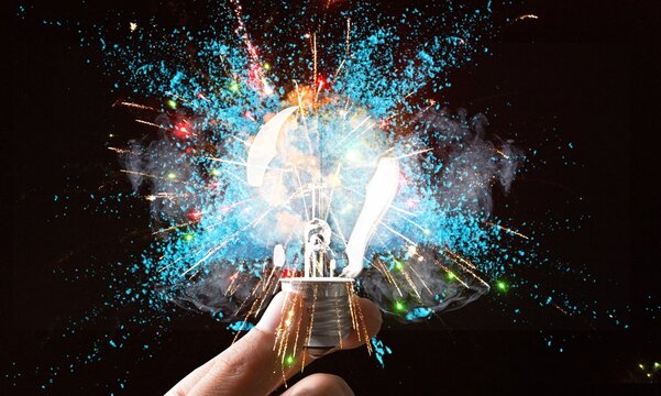 Creative colored explosion in light bulb