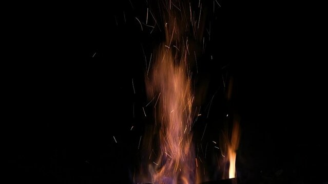 Flames Of Fire And Sparks On Black Background. Magic Fier. Bonfire Flaming In The Night. Burning Sparks Flying. Fiery Orange Glowing Flying Away Particles On Black Background.