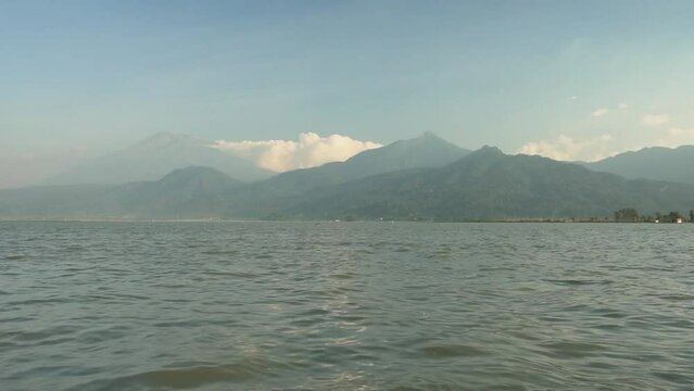 Ambarawa, Indonesia - July Tuesday 2023 : Mount Telomoyo from Lake Rawa Pening.