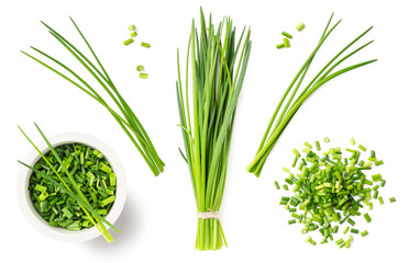 fresh green herbs: chives in a bunch, blades, chopped loose pieces, in a heap and a bowl, isolated...