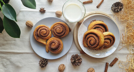 Flat lay of baked cinnamon buns composition. Homemade.