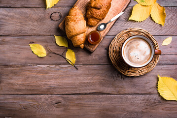 Autumn breakfast - coffee and croissants