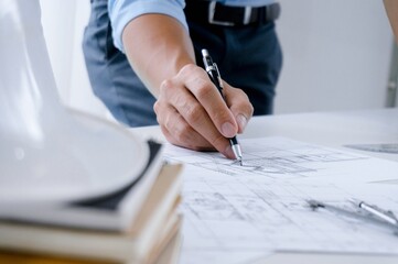 Colleagues interior designer Corporate Achievement Planning Design on blueprint Teamwork Concept...