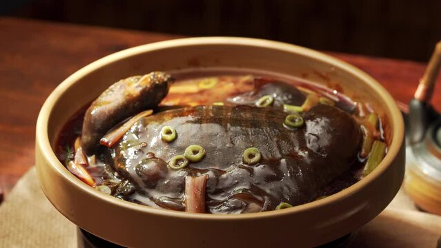 Special Chinese cuisine Braised soft-shelled turtle with scallions