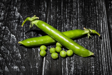green pea on wood background