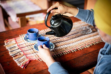Reminiscent Morning: Steaming Coffee in a Quaint Domestic Atmosphere