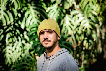 Sunny Disposition: Smiling, Confident Man Embracing Outdoor Wellness