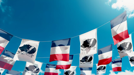 Flags of Corsica - France against the sky, flags hanging vertically