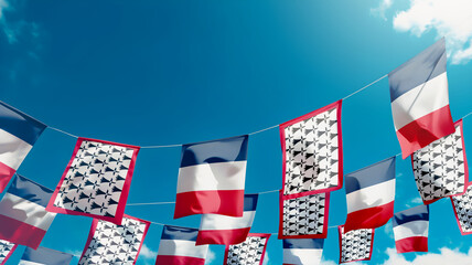 Flags of Limousin - France against the sky, flags hanging vertically