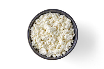 Gray ceramic bowl with grained cottage cheese isolated on white background. Top view with copy space