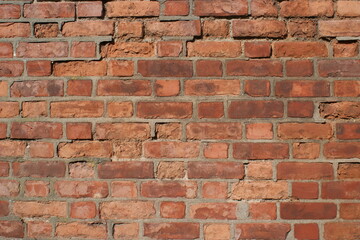 Old damaged brick wall. Background texture.